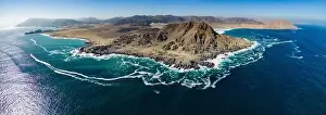 Greenish Prints: Panorama view of Isla Pan de Azúcar in the National Park Pan de Azúcar at the coast of the Atacama desert in Chile