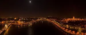 National Gallery Prints: Panoramic aerial drone shot of Danube with moon National Gallery and chain bridge in Budapest night