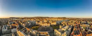 Morning Glow Prints: Panoramic Aerial drone shot of east side facade of Hungarian Parliament Kossuth Square during Budapest sunrise