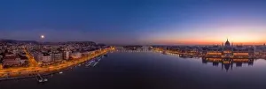 Morning Glow Prints: Panoramic aerial drone shot of Hungarian Parliament lights off sunrise in Budapest dawn