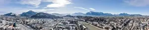 Panoramic aerial drone shot view of Salzburg aiglhof station with view of eastern bavarian alps mountain