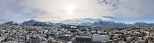 Salzach Prints: Panoramic aerial drone shot view of Salzburg aiglhof station with view of eastern bavarian alps mountain