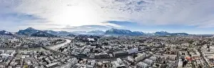 Panoramic aerial drone shot view of Salzburg aiglhof station with view of eastern bavarian alps mountain