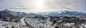 Panoramic aerial drone shot view of snoy Salzburg in winter morning