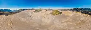 Panoramic Aerial shot of the Bromo volcano and Batok volcano at the Bromo Tengger Semeru National Park on Java Island