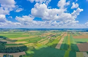 Grass And Sky Prints: Panoramic Aerial vast green field view - Agriculture field aerial photo - Green landscapes drone photo