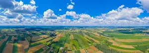 Grass And Sky Prints: Panoramic Aerial vast green field view - Agriculture field aerial photo - Green landscapes drone photo