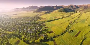 Armenia Prints: Panoramic aerial view of lush green fields and village houses