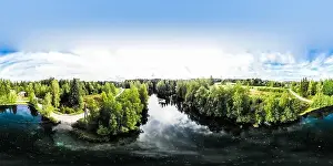 Groundwater Prints: Panoramic aerial view of mystically turquoise coloured spring Kiikunlahde in Hollola