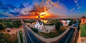 City Road Prints: Panoramic aerial view of old church near river and bridge in small european city at summer day