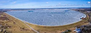 Panoramic aerial view of the winter dam near hydroelectric power plant