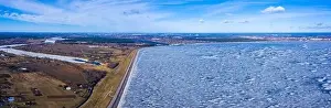 Panoramic aerial view of the winter dam near hydroelectric power plant