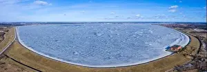 Panoramic aerial view of the winter dam near hydroelectric power plant