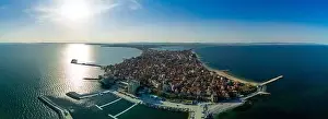 Panoramic bird's eye view over small ancient resort town of Pomorie with old European small houses