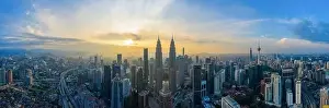 Kuala Prints: Panoramic drone aerial view of sunrise at Kuala Lumpur city skyline