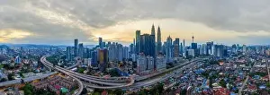 Panoramic drone aerial view of sunrise at Kuala Lumpur city skyline