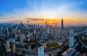 Kuala Prints: Panoramic drone aerial view of sunrise at Kuala Lumpur city skyline
