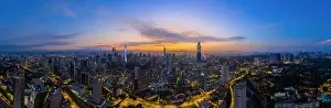 Light Night Prints: Panoramic drone aerial view of sunrise at Kuala Lumpur city skyline