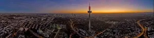 Afterglow Prints: Panoramic drone image of the Frankfurt skyline with television tower in the evening during a colorful