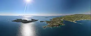 Surfers Prints: Panoramic drone photo of the tropical beach in the bay of Toroni in Halkidiki, Greece