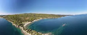Surfers Prints: Panoramic drone photo of the tropical beach in the bay of Toroni in Halkidiki, Greece