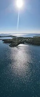 Surfers Prints: Panoramic drone photo of the tropical beach in the bay of Toroni in Halkidiki, Greece