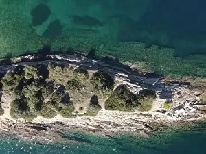 Surfers Prints: Panoramic drone photo of the tropical beach in the bay of Toroni in Halkidiki, Greece