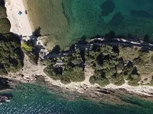 Surfers Prints: Panoramic drone photo of the tropical beach in the bay of Toroni in Halkidiki, Greece
