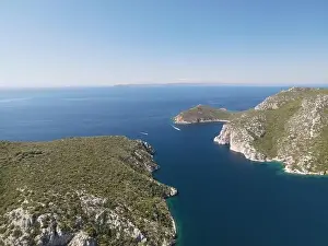 Surfers Prints: Panoramic drone photo of the tropical beach in the bay of Toroni in Halkidiki, Greece