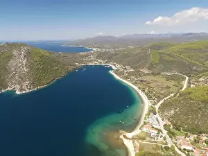 Surfers Prints: Panoramic drone photo of the tropical beach in the bay of Toroni in Halkidiki, Greece