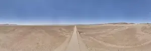 Uncertain Prints: Panoramic drone picture of lonely gravel road through the desert on the edge of the Namib-Naukluft National Park