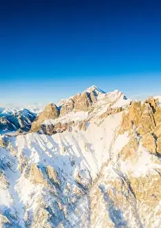 Panoramic of Grigna Settentrionale (Grignone) covered with snow, aerial view, Lake Como, Lecco province, Lombardy, Italy