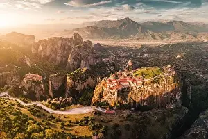 Panoramic majestic aerial view of the famous Meteora flying monasteries in Greece at sunrise