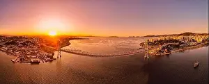 Santa Catarina Prints: Panoramic view of Hercilio luz cable bridge with sunset light in Florianopolis, Brazil