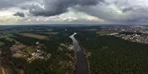 Meandering Prints: panoramic view from a high altitude of a meandering river in the forest