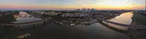 Panoramic view of large city with multiple bridges over river. Drone, aerial view