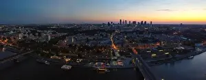 Panoramic view of large city with multiple bridges over river. Drone, aerial view