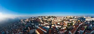 Separated Prints: Panoramic view of Lisbon; old yellow rooftops in Portuguese capital
