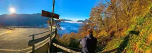 Lugano Prints: Panoramic View over Mountain Peak San Salvatore Above Cloudscape with Sunlight and Clear Sky in Lugano