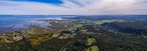 panoramic view of the mouth of the river Chamiza during low tide on a day with high clouds