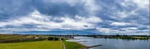 Moody Sky Prints: Panoramic view of the Rhine and the A1 motorway bridge near Leverkusen