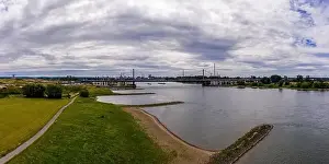 Moody Sky Prints: Panoramic view of the Rhine motorway bridge near Leverkusen, Germany. Drone photography