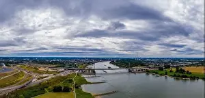 Moody Sky Prints: Panoramic view of the Rhine motorway bridge near Leverkusen, Germany. Drone photography