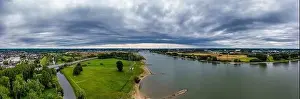 Moody Sky Prints: Panoramic view of the rivers Rhine and Wupper near Leverkusen, Germany. Drone photography