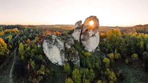 A panoramic view of the unique Okiennik rock in Poland with a large natural window