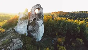 A panoramic view of the unique Okiennik rock in Poland with a large natural window