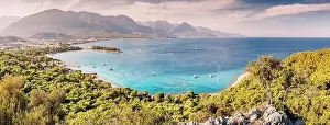 Taurus Prints: a panoramic vista of Kemer's hotels harmoniously nestled between a picturesque sea beach
