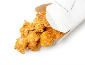 Nuggets Prints: Paper box with crunchy popcorn chicken on white background