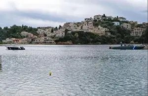Parga Epirus Greece. Aerial drone view of waterfront Ionian city buildings