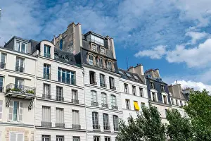 Dwellings Prints: Paris (France): building facades along the quay “Quai d'Orleans”